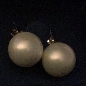 PEARL EARRINGS very large lustrous white pearls… I think they are white gold.